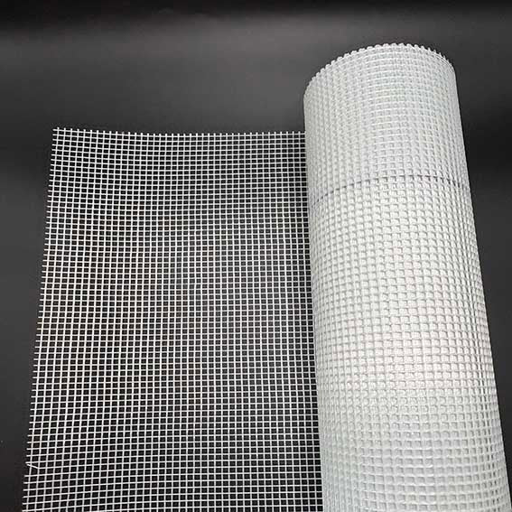 roll of render mesh on a black background