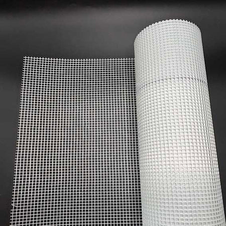 roll of render mesh on a black background