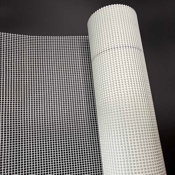 roll of render mesh on a black background