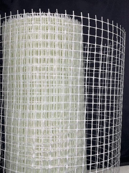 roll of render mesh on a black background