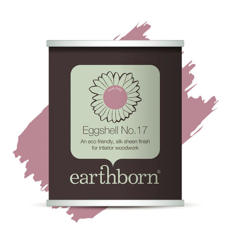 A single can of earthborn Eggshell No. 17 eggshell finish lacquer for interior woodworking, shown on a white background with a dusty pink paint stroke behind it.