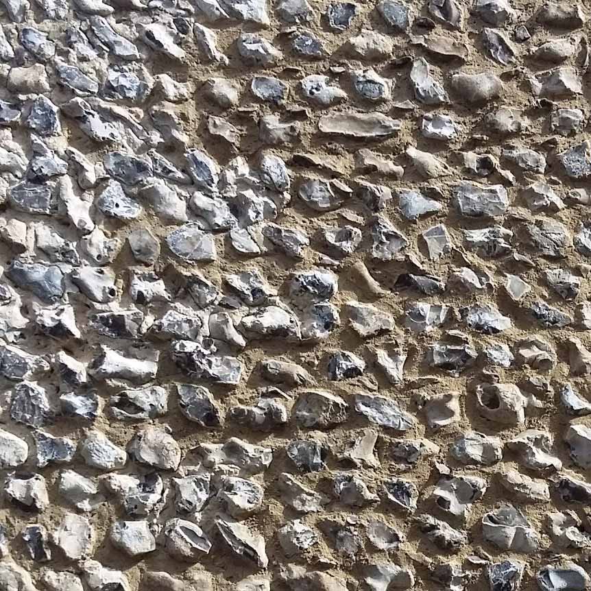 close up of unknapped field flint wall