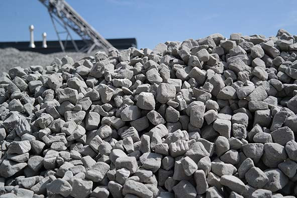 Pile of gray foamglass 65 with a blue sky background