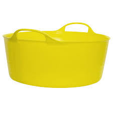 Yellow plastic bathtub with handles on a white background
