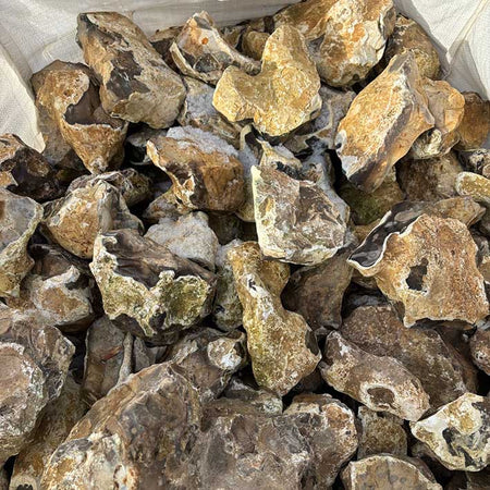 pile of large unknapped field flints in a bulk bag