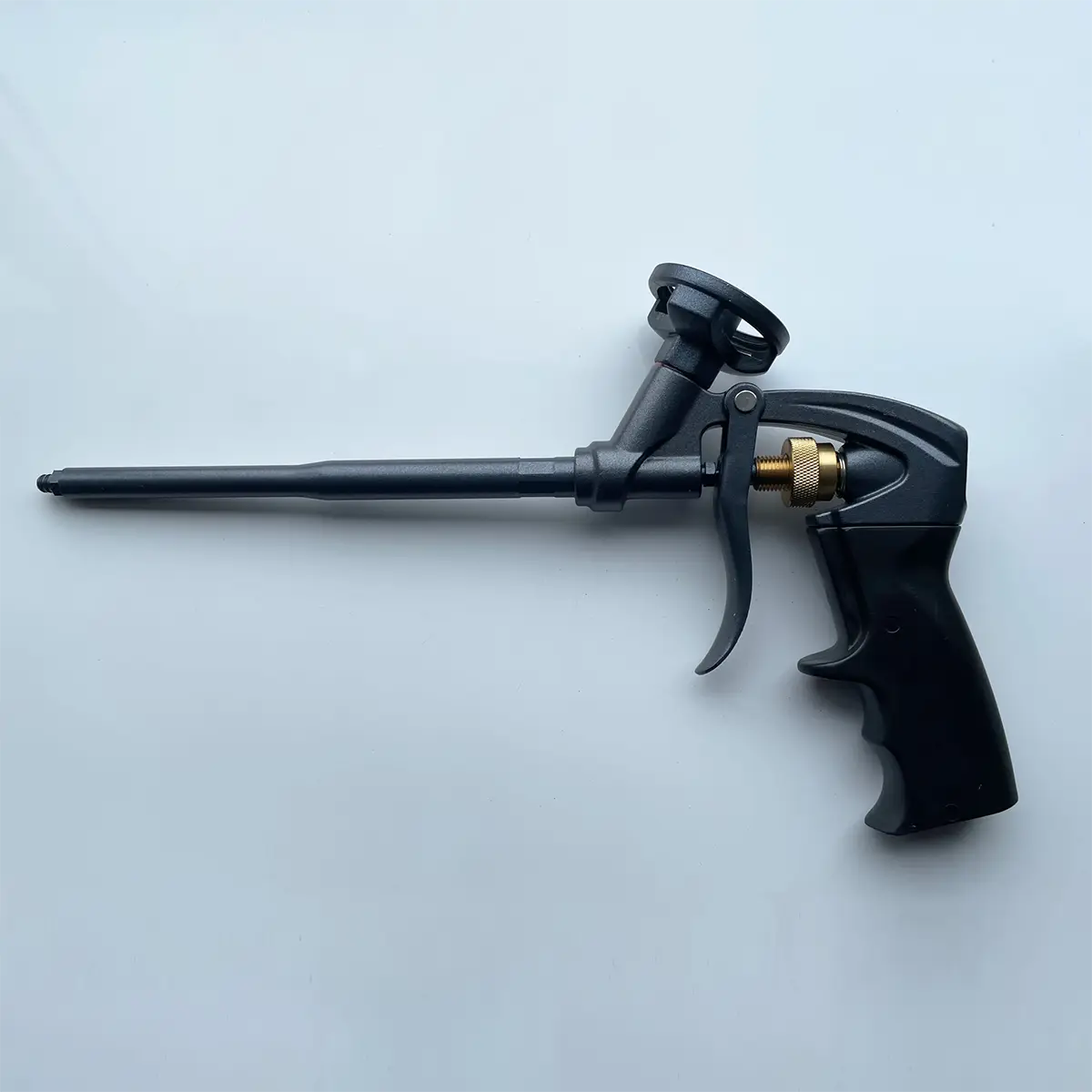 Black foam cannon on a light gray background