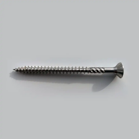 Metal screw on a light gray background