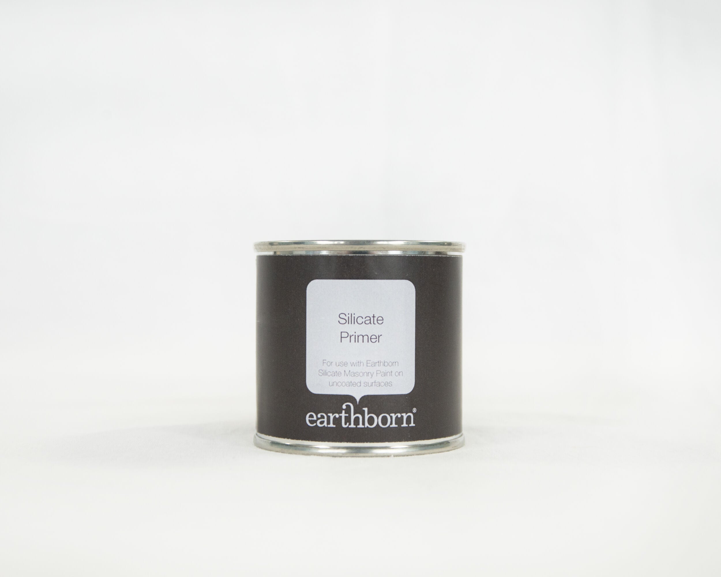 Earthborn silicone primer can on a white background