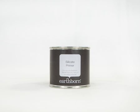 Earthborn silicone primer can on a white background